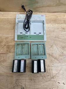 lot 184 image: Leica Battery Charger 4 Batteries