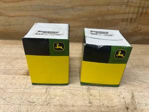 lot 209 image: JOHN DEERE MIU802421 Primary Fuel Filter Element and MIU800650 Engine Oil Filter