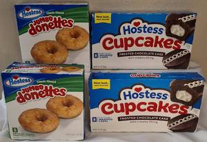lot 17 image: HOSTESS Snacks  (2) Boxes JUMBO Donettes & (2) Boxes Hostess Cupcakes