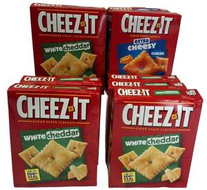 lot 26 image: CHEEZ IT Lot   (7)  White Cheddar & (2) Extra Cheesy Boxes -7.0 oz each box