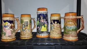 lot 99 image: Steins (4) and Pouring Pitcher. Japan