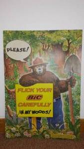 lot 104 image: Vintage Smokey Bear Flick Your Bick Carefully in My Woods Cardboard Sign.