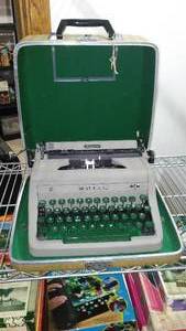 lot 105 image: Vintage Royal  Aristocrat Typewriter, with locking Case and Key