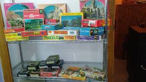 lot 108 image: Vintage Puzzles Galore and Foot Locker.