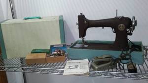 lot 109 image: Rotary Electric Vintage Reversew Sewing Machine.