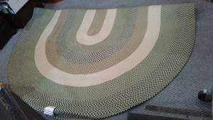 lot 124 image: 8 ft. x 11 ft Braided Rug, Greens, Cream.