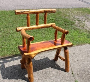lot 135 image: High quality cedar log chair