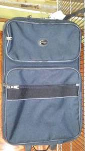 lot 173 image: New 22 in. American Tourister Rolling Suitcase with lockKey.