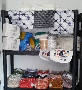 lot 182 image: Noras Nursery Reusable Diapers (30), Breast Pumps, Asthma Management. Reusable Diapers (NewLike New), Disposable Diapers, Rechargeable Breast Pump, Travel Bags and More. HIGH $$$$ Lot.