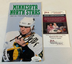 lot 32 image: Mike Modano Signed Minnesota North Stars 1991-92 Training Camp Guide with JSA COA