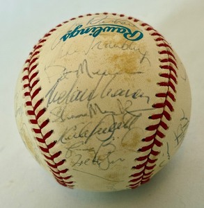 lot 1 image: 1993 Minnesota Twins Team Signed Baseball - 31 Players Including Puckett, Winfield, Hrbek, Gaetti, Erickson, Tapani, Mack, Kelly, Harper - OALB Brown Rawlings Ball