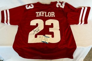 lot 80 image: Jonathan Taylor Signed Football Jersey With Beckett COA Size XL