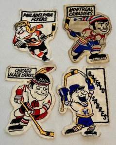lot 24A image: (5) 1970s Vintage Hockey Patches - Chicago Blackhawks, Buffalo Sabres, Montreal Canadiens, Philadelphia Flyers