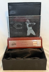 lot 98A image: Barry Larkin 150 2003 Absolute Memorabilia Game-Worn Jersey Relic and Plaque