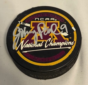 lot 151A image: Johnny Pohl Signed 2002 University of Minnesota National Champions Hockey Puck
