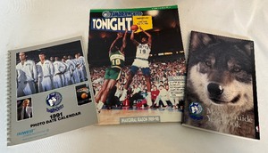 lot 195 image: (3) Minnesota Timberwolve Publications - 1989 Game Program, 1991 Photo Calendar, 1992-93 Media Guide Yearbook Basketball
