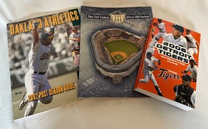 lot 197 image: (3) Misc Baseball Info Guides and Yearbooks - 2006 Tigers, 2008 Yankees, 2002 As