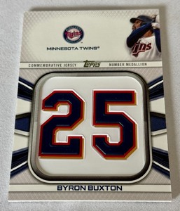 lot 69B image: Byron Buxton Commemorative Jersey Number Medallion 2022 Topps #JNM-BBU Minnesota Twins Baseball Card