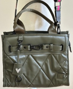 lot 33 image: Shawn Killinger The Superstar IHKWIP Quilted Olive Green Tote Bag with Star Strap and Extra Braided Handle