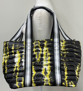 lot 101 image: Think Royln Quilted Tote Bag with Yellow and Black Tie-Dye Pattern