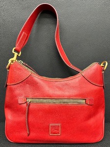 lot 29 image: Dooney & Bourke Red Leather Shoulder Bag with Brass Hardware
