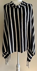 lot 73 image: Caroline Grace Black and White Striped Poncho with Fringes