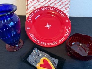 lot 49 image: Love is Indiana Glass Red Footed Candy Dish with Special Plate, Stunning Vase and Ceramic Heart