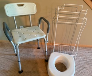 lot 63 image: Bathroom Assistance--Shower Chair, Toilet Extender & Towel Rack
