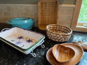 lot 15 image: LeCreuset Pot, Decorative Casserole Pan, Vintage Wooden Pineapple tray & Baskets