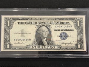 lot 4 image: 1935 E Blue Seal $1 Dollar Silver Certificate Uncirculated