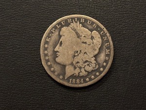 lot 27 image: 1884-O Morgan Dollar