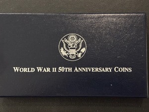 lot 64 image: 1991-95 W World War II Silver Dollar Proof
