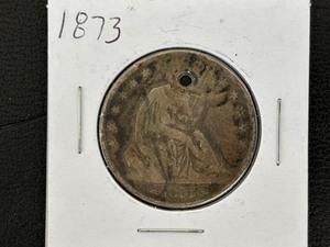 lot 139 image: 1873 Liberty Seated Half Dollar - Hole in Coin