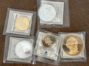 lot 166 image: Gold and Silver Layered Medallions