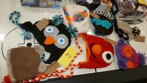 lot 83 image: Lot of 7 new home knit kids hats