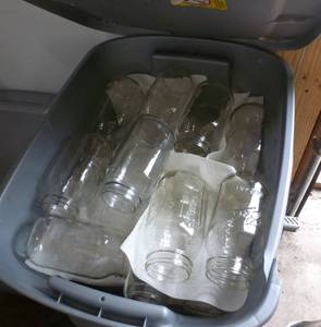 lot 102 image: Tote full of canning jars