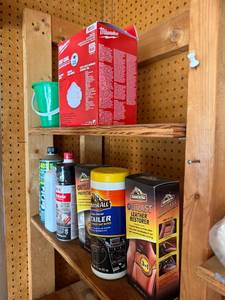 lot 12 image: Assorted Garage Item Collection Including Milwaukee Masks and Armor All Products - content quantities unknown