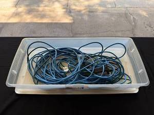 lot 33 image: Collection of Blue Extension Cords in Storage Tub