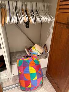 lot 54 image: Colorful Sleeping Bag with PhotoMemory Book, Hangers
