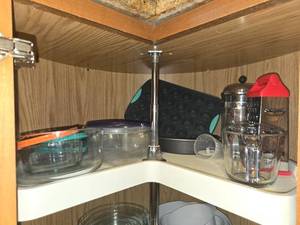 lot 75 image: Assorted Kitchenware Collection Including Glass Bowls, Muffin Pan, and Grater