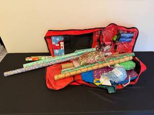 lot 163 image: Christmas Gift Wrap and Storage Set with Wrapping Paper, Ribbons, and Bag