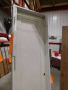 lot 151 image: Masonite 24 in. x 80 in. 1 Panel Left-Handed Primed Composite Solid Core Single Prehung Interior Door 4-916 in. Flat Jamb