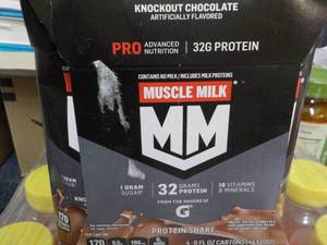 lot 131 image: 4 pack Muscle Milk Protein Shakes...