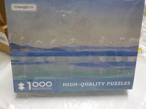 lot 215 image: 1000 pc Puzzle...
