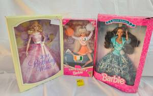 lot 281 image: THREE SPECIAL BARBIES