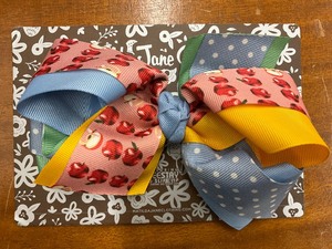 lot 124 image: Matilda Jane Apple Print Grosgrain Hairbow