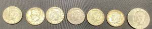 Collection of American Coins-Contains 6 Kennedy Half Dollars and 1 Eisenhower Half Dollar