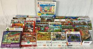 lot 24 image: Massive Lot of 300 Piece Puzzles - Lot 1 - Includes 35 Puzzles