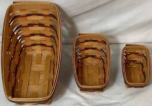 lot 85 image: Longaberger Dash Away Sleigh Christmas Basket Set