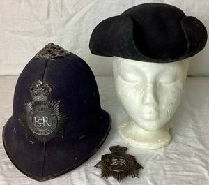 lot 64 image: Authentic Vintage Bobby Metropolitan British Police Hat with Additional Hat Badge and Tricorn Wool Hat - Size Medium
